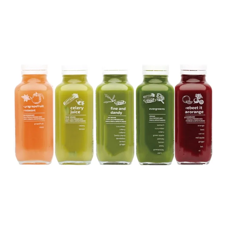 Cold pressed bottles in a row